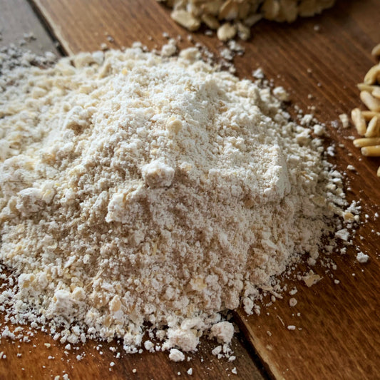 Living Sky Farm's Oat Flour (whole grain) on brown table