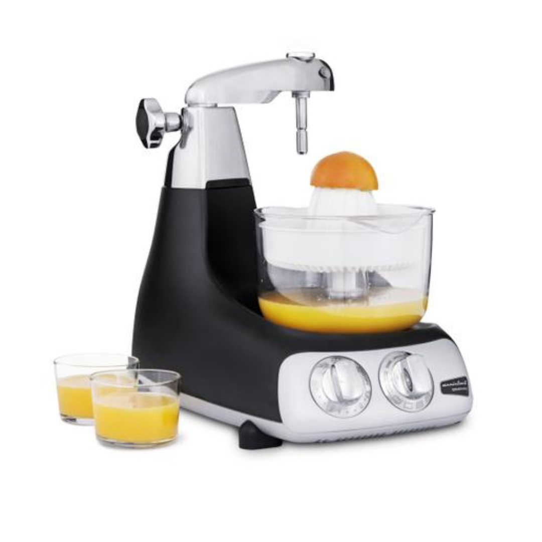 Anka mixer being used with the citrus press making orange juice