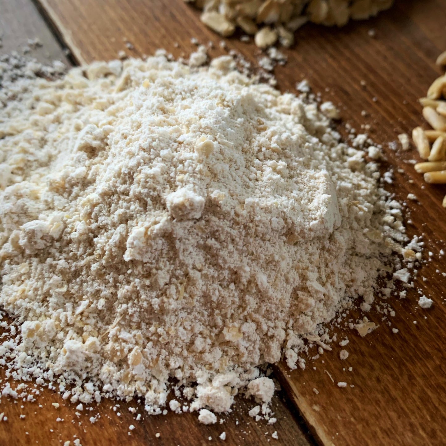 Living Sky Farm's Oat Flour (whole grain) on brown table